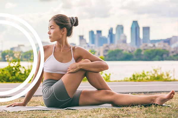 Woman doing yoga outdoor to illustrate the health factor of our weight loss program